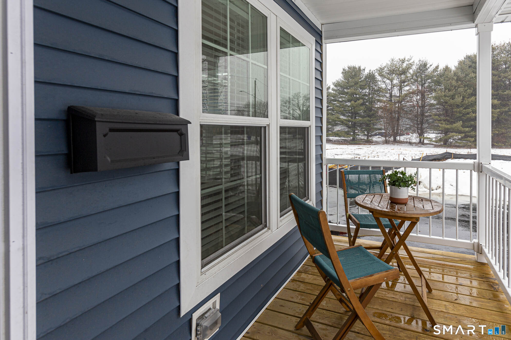 67 Middle Road Enfield, CT 06082 - Photo 29 of 35 a balcony with table and chairs