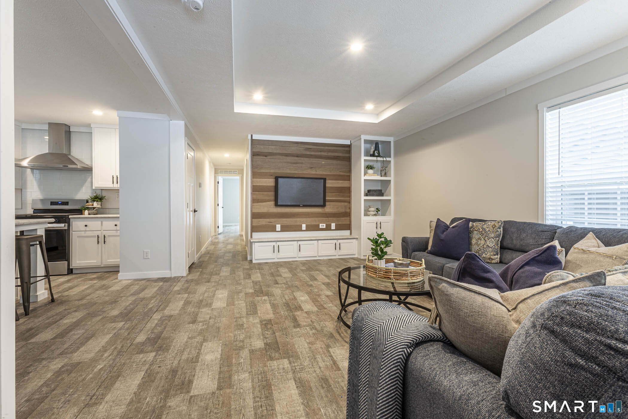 67 Middle Road Enfield, CT 06082 - Photo 3 of 35 a living room with furniture and a flat screen tv