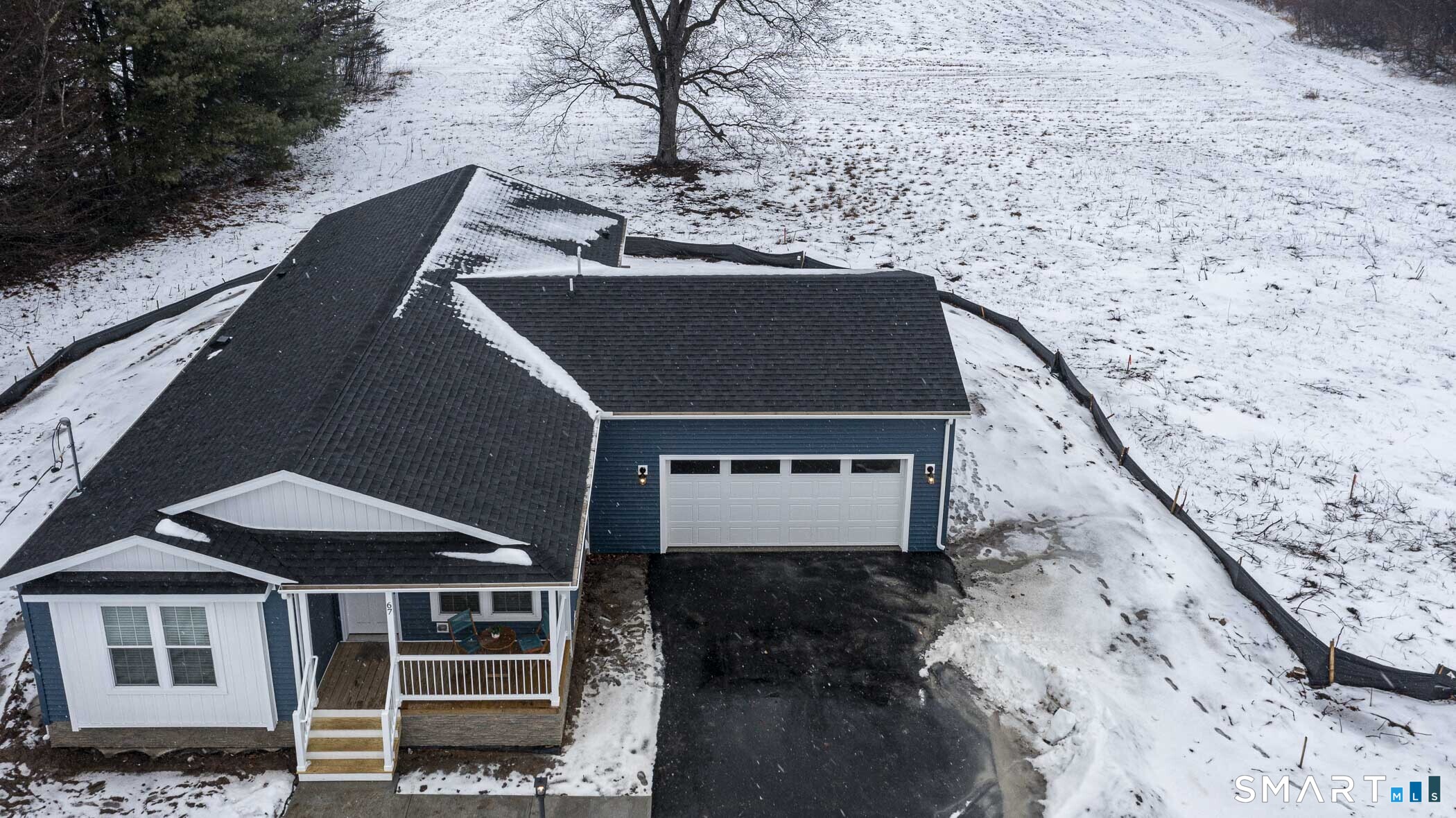 67 Middle Road Enfield, CT 06082 - Photo 34 of 43 a aerial view of a house with a yard