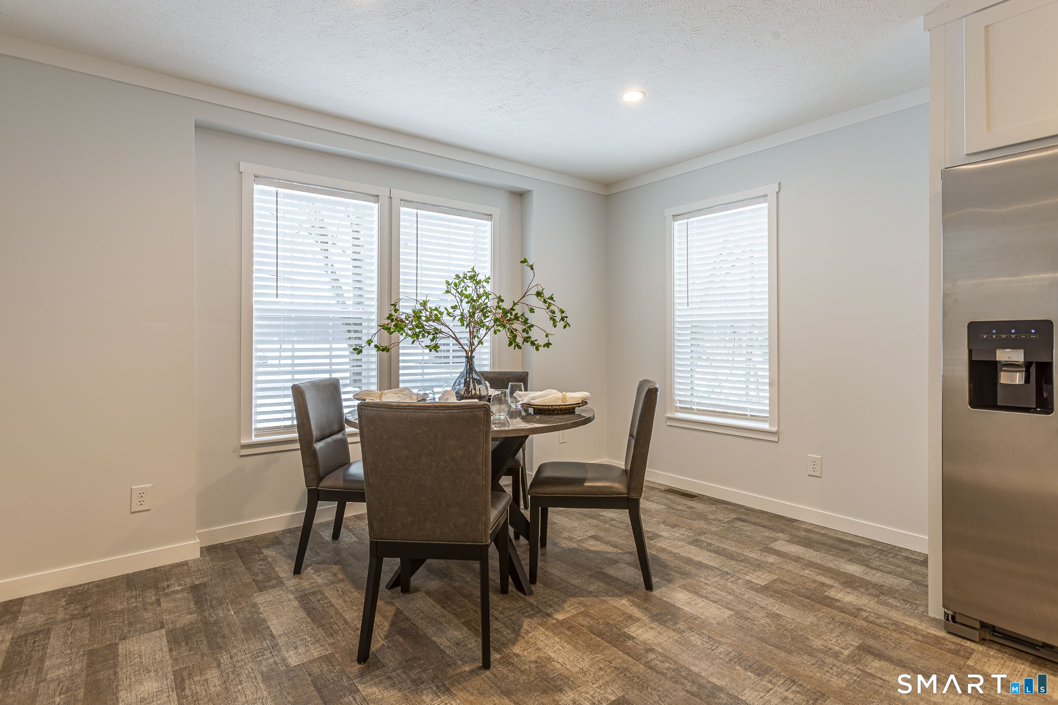 67 Middle Road Enfield, CT 06082 - Photo 9 of 35 a dining room with furniture and window