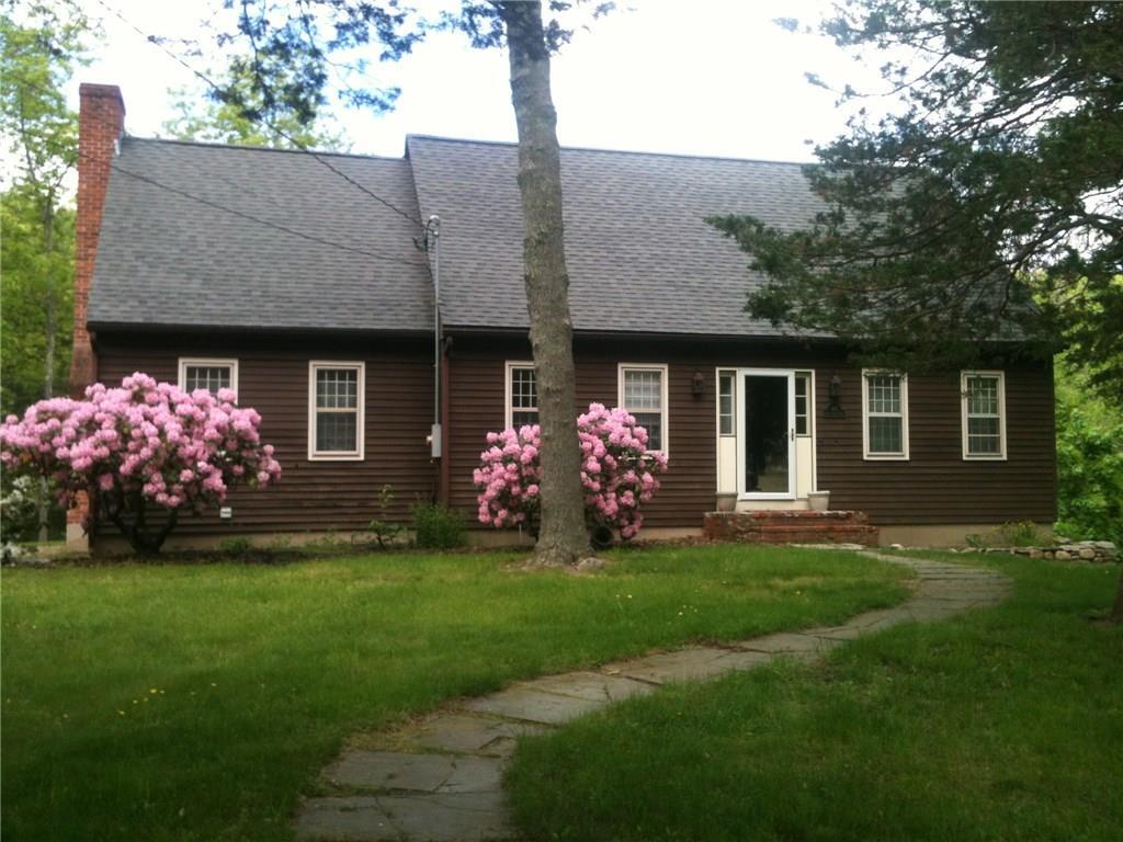 68 Titus Coan Road Killingworth, CT 06419 - Photo 1 of 1 a front view of house with yard and green space
