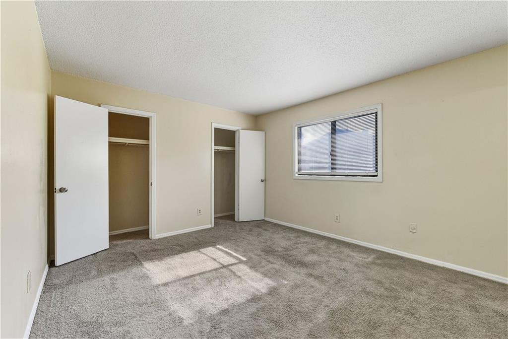 4755 Yates Road, Unit 6D College Park, GA 30337 - Photo 12 of 15 an empty room with windows