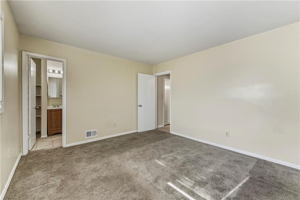 4755 Yates Road, Unit 6D College Park, GA 30337 - Photo 13 of 15 an empty room with closet area