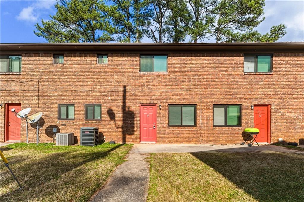 4755 Yates Road, Unit 6D College Park, GA 30337 - Photo 15 of 15 a front view of a house with a yard