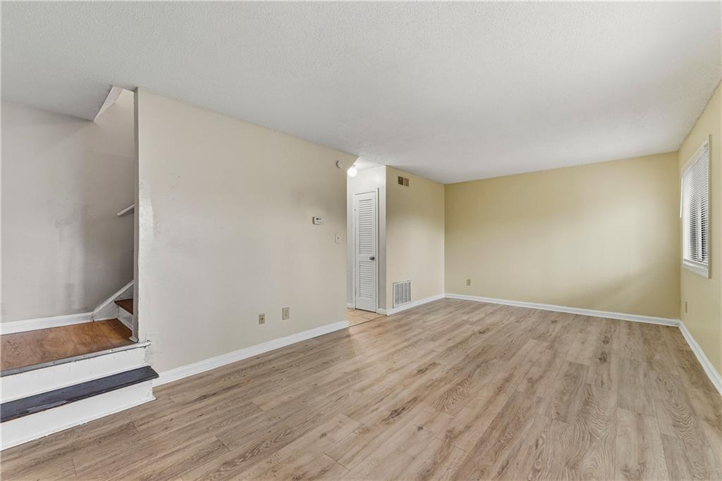 4755 Yates Road, Unit 6D College Park, GA 30337 - Photo 2 of 15 wooden floor in an empty room