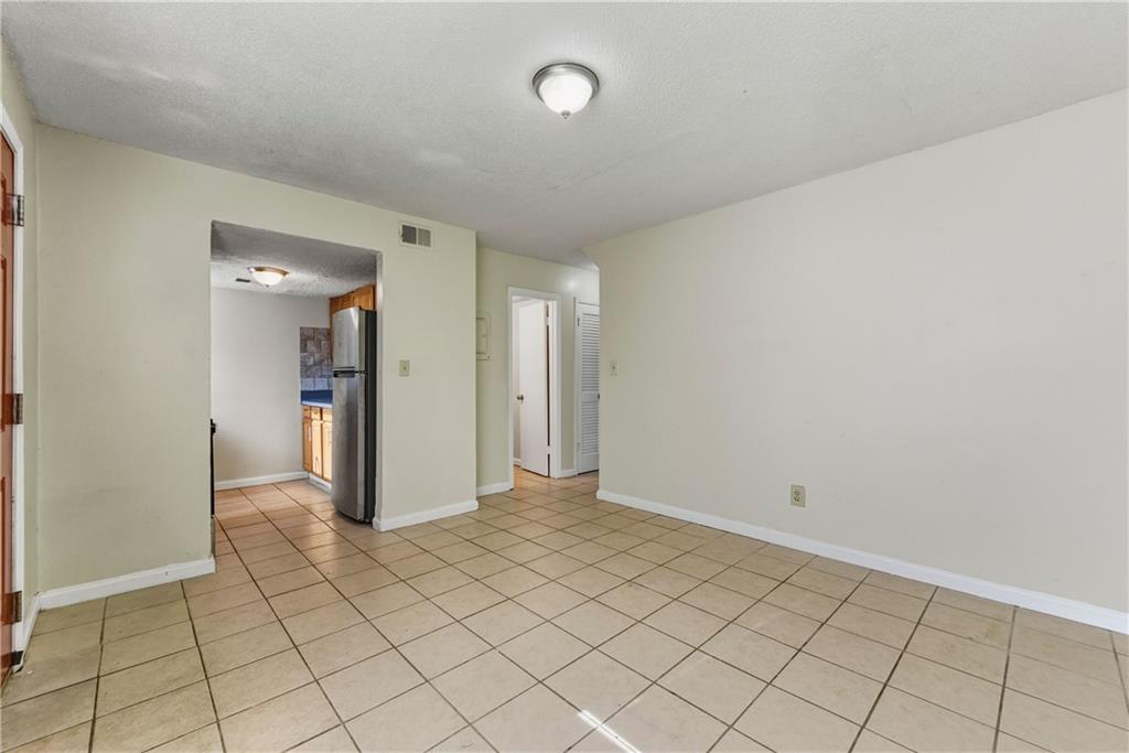 4755 Yates Road, Unit 6D College Park, GA 30337 - Photo 6 of 15 a view of an empty room and window