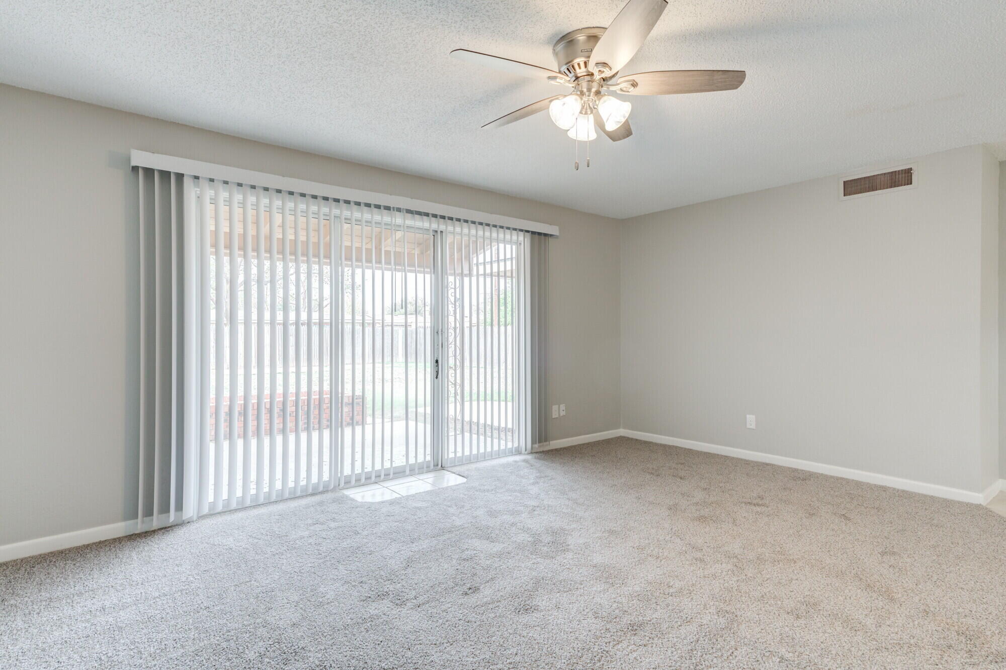 4916 46th Street Lubbock, TX 79414 - Photo 12 of 31 a view of an empty room with a window