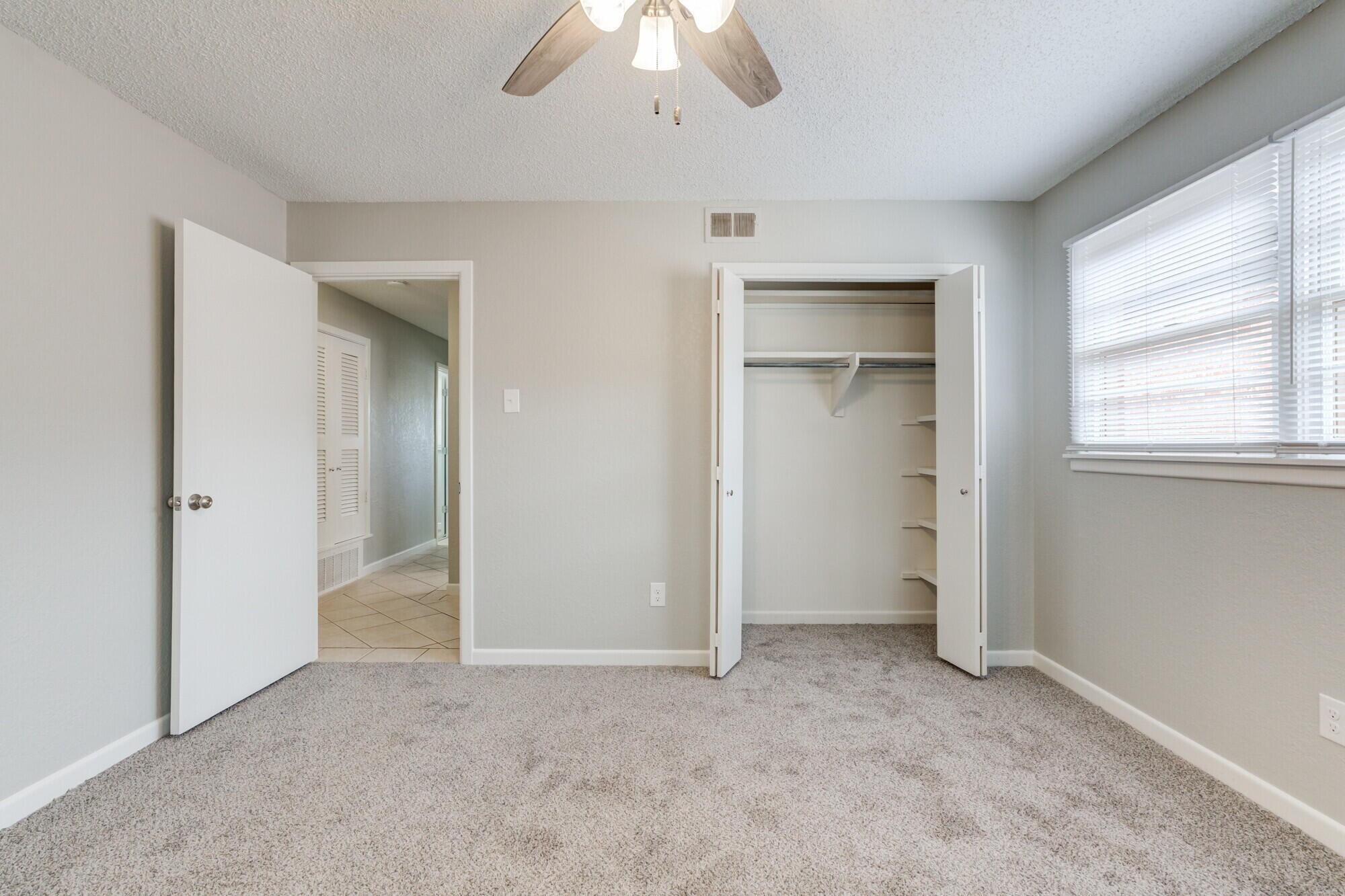 4916 46th Street Lubbock, TX 79414 - Photo 18 of 31 a view of an empty room with a window