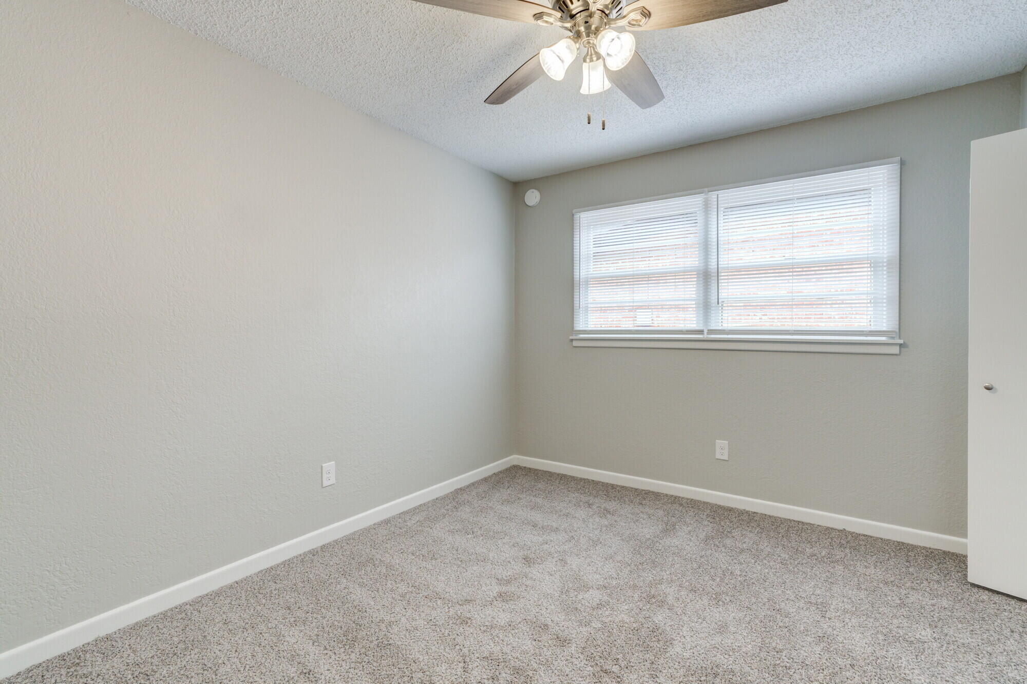 4916 46th Street Lubbock, TX 79414 - Photo 21 of 31 an empty room with a window