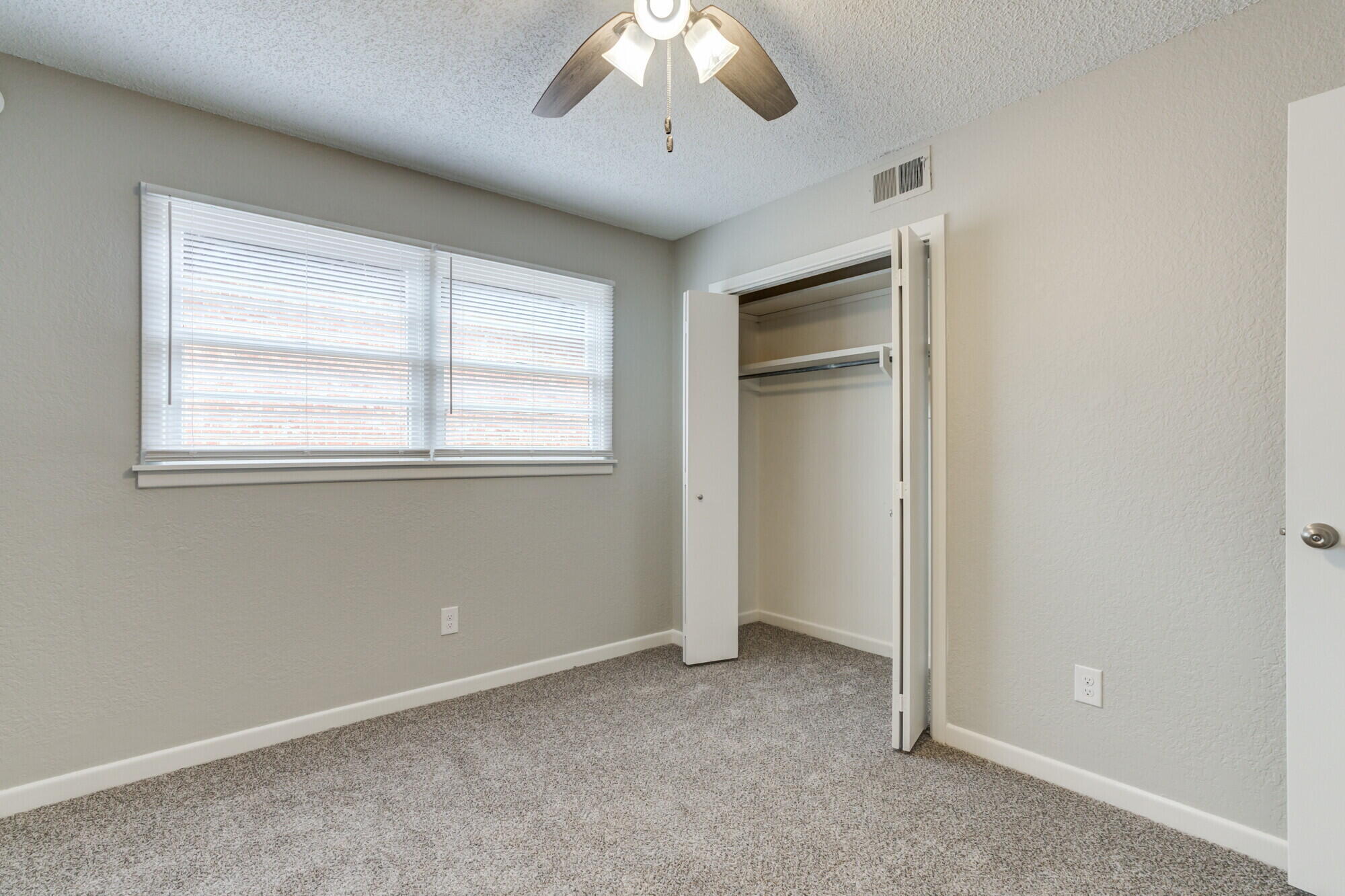 4916 46th Street Lubbock, TX 79414 - Photo 22 of 31 a view of an empty room with a window