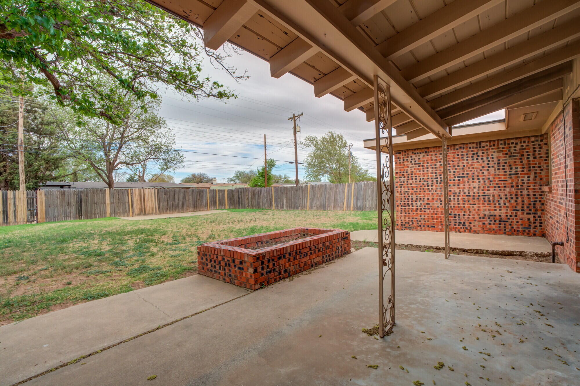 4916 46th Street Lubbock, TX 79414 - Photo 28 of 31 a garden view with a seating space