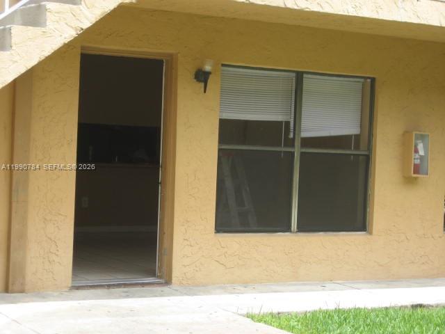 15328 Southwest 72nd Street, Unit 814 Miami, FL 33193 - Photo 8 of 15 a view of wooden door