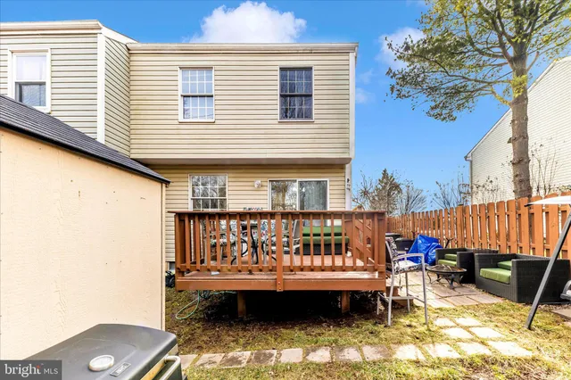 a view of balcony with furniture