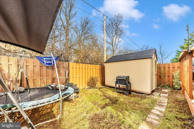 a view of a backyard with a patio