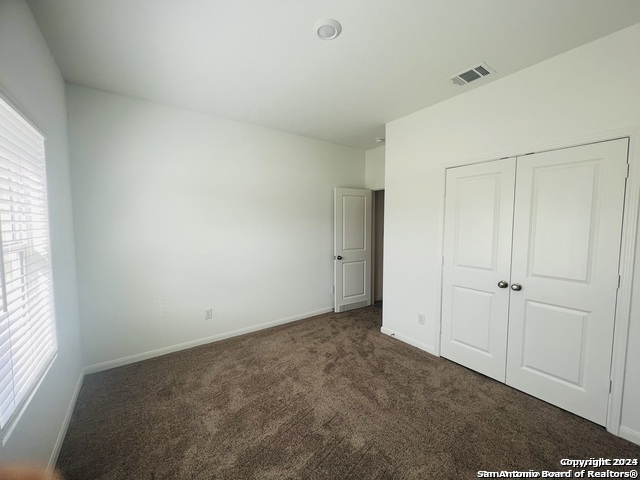 32141 Morels Avenue Bulverde, TX 78163 - Photo 13 of 22 a view of an empty room and a window