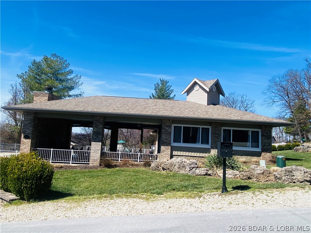 1004 South Beacon Ridge Lake Ozark, MO 65049 - Photo 7 of 11 Club house & Screened Patio