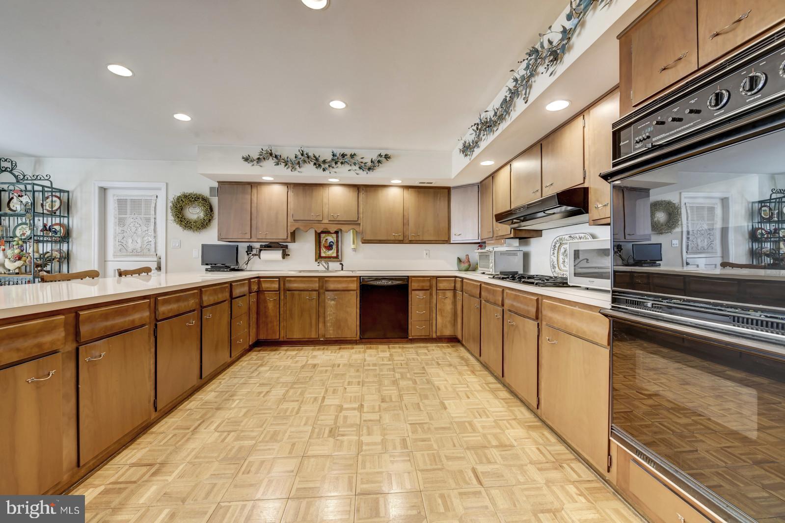 286 Juliustown Road Juliustown, NJ 08022 - Photo 13 of 33 a large kitchen with stainless steel appliances kitchen island granite countertop a sink counter space cabinets and a large window