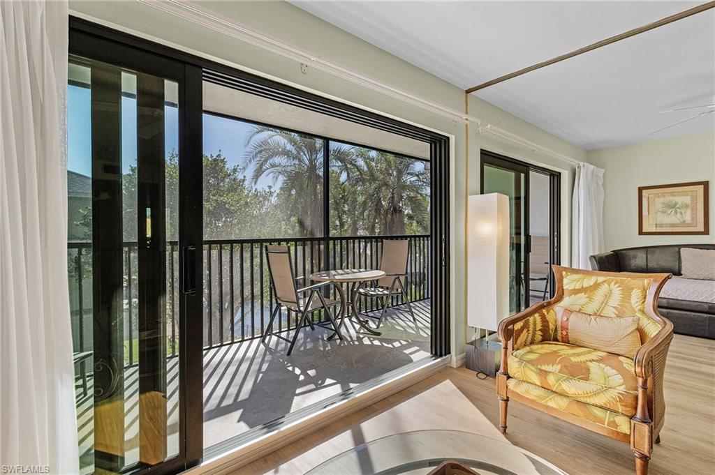 600 Neapolitan Way, Unit 349 Naples, FL 34103 - Photo 24 of 34 a view of living room filled with furniture