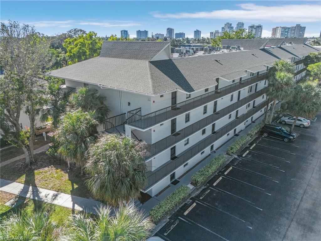 600 Neapolitan Way, Unit 349 Naples, FL 34103 - Photo 30 of 34 an aerial view of a house