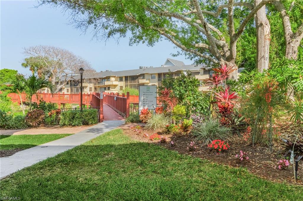 600 Neapolitan Way, Unit 349 Naples, FL 34103 - Photo 32 of 34 a view of a backyard