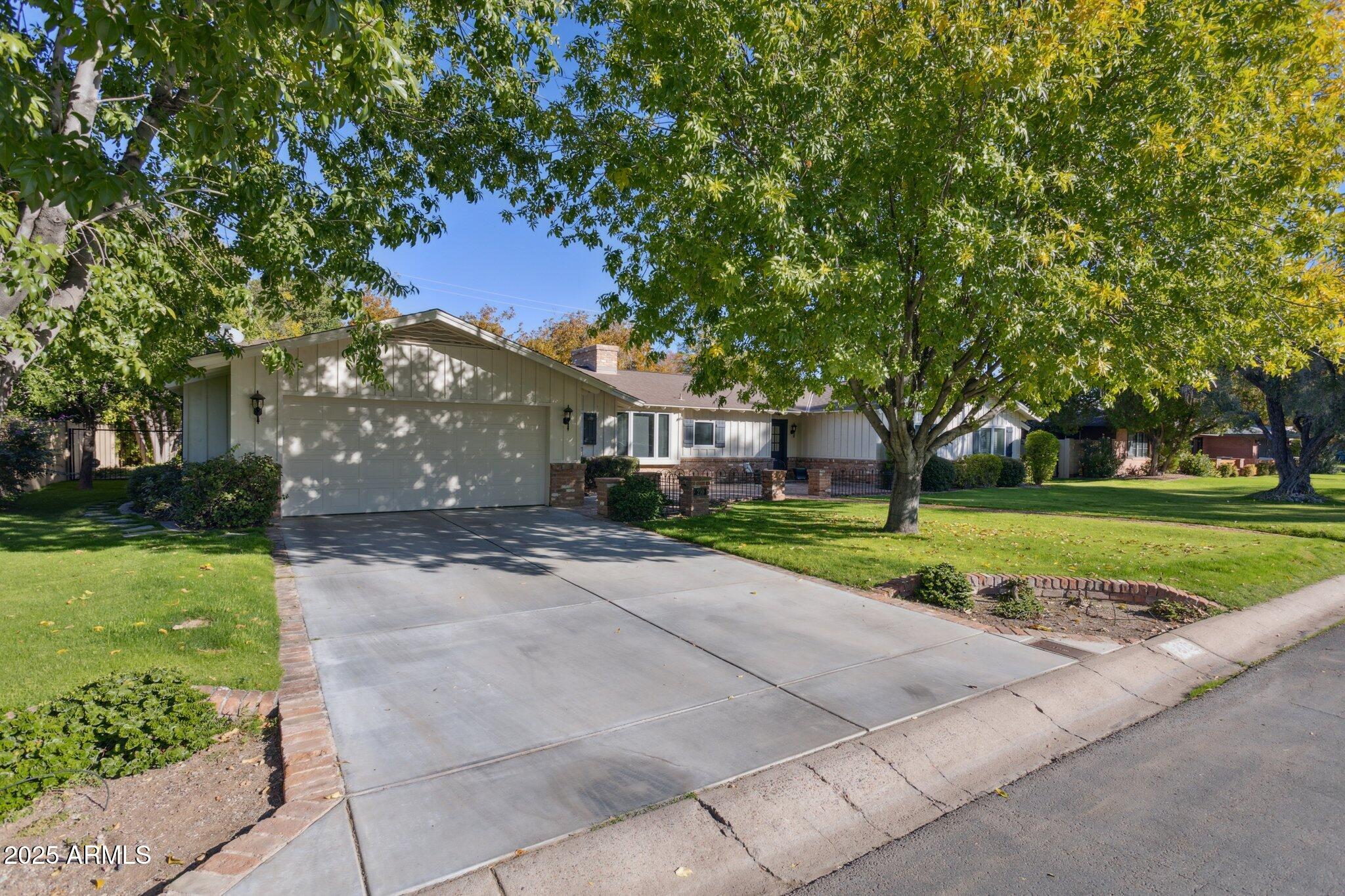 a view of a house with a big yard