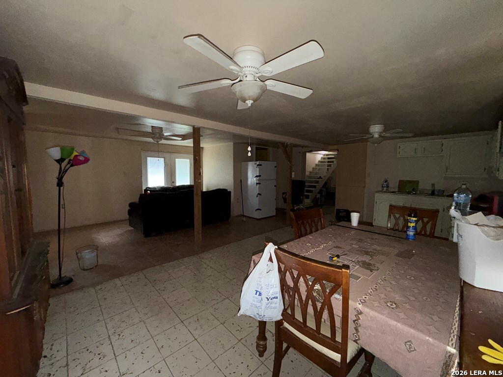 3148 Leonel Street Eagle Pass, TX 78852 - Photo 2 of 18 a dining room with furniture and a chandelier