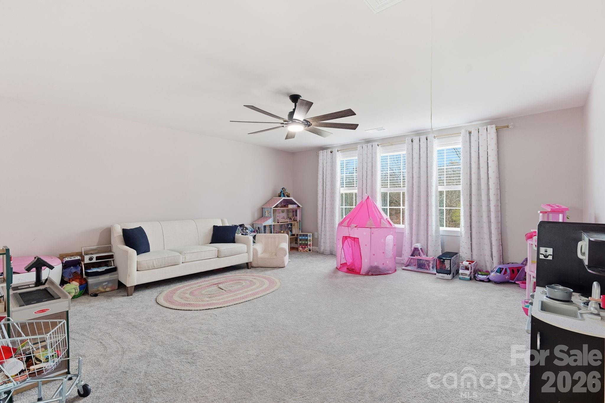 3911 Horsham Street Fort Mill, SC 29707 - Photo 11 of 41 a living room with furniture a air conditioner vent and a window
