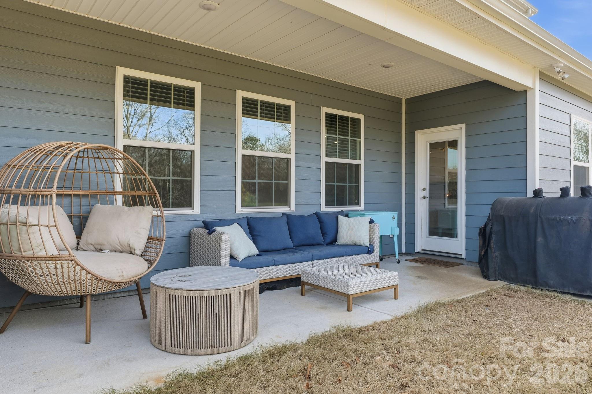 3911 Horsham Street Fort Mill, SC 29707 - Photo 12 of 41 a outdoor living space with furniture and a window