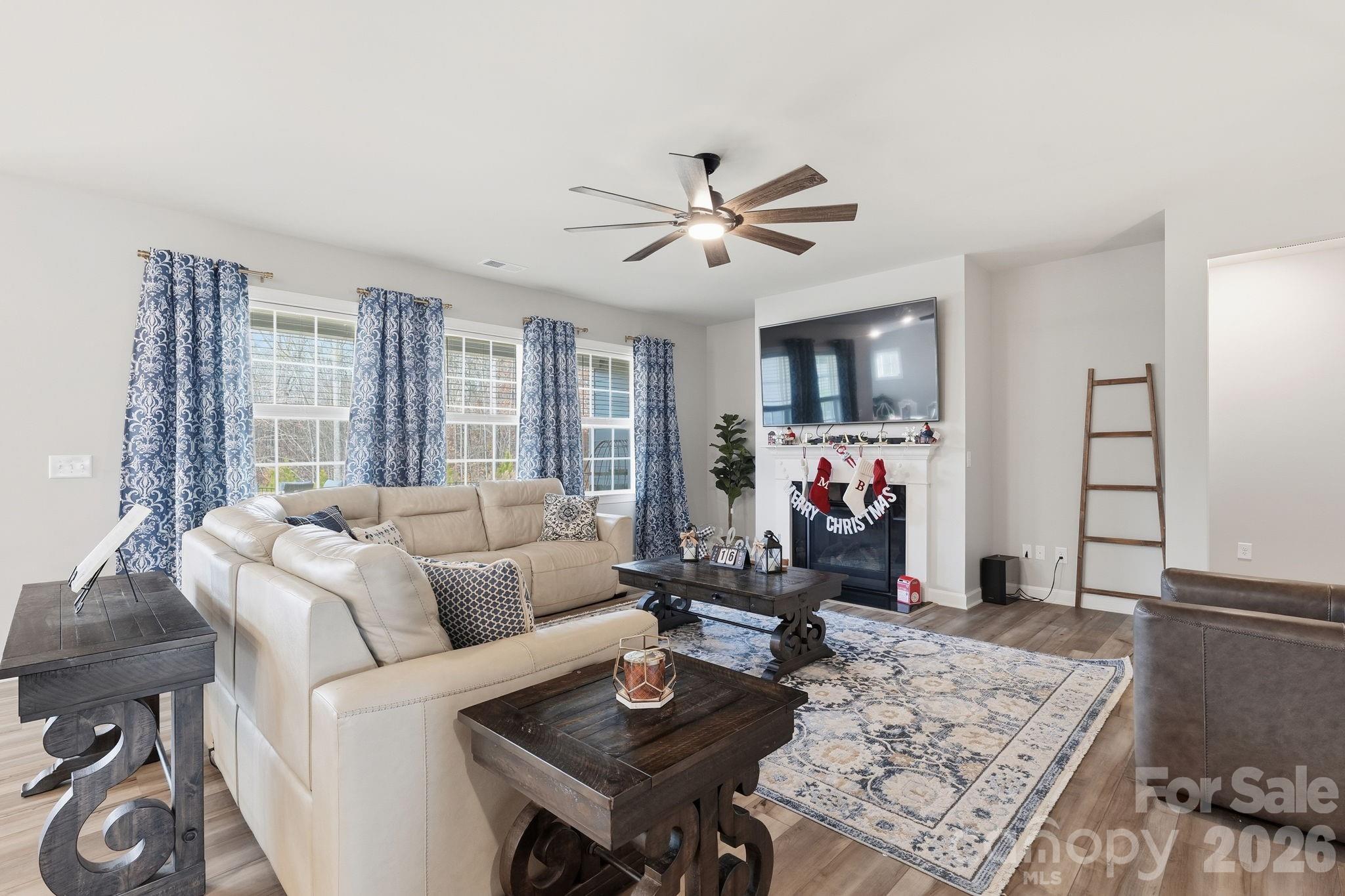 3911 Horsham Street Fort Mill, SC 29707 - Photo 17 of 41 a living room with furniture and a window