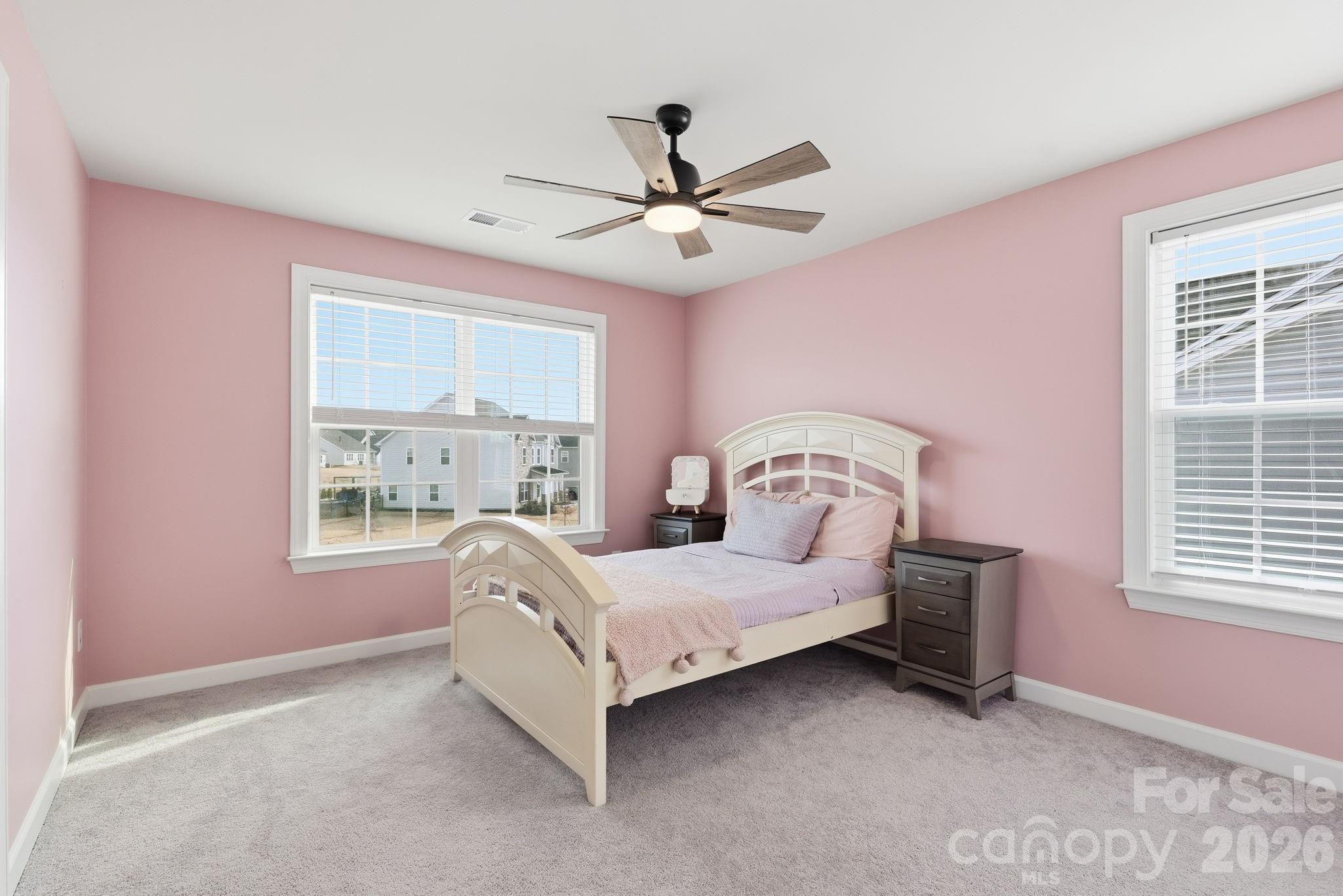 3911 Horsham Street Fort Mill, SC 29707 - Photo 23 of 41 a bedroom with a bed next to a window