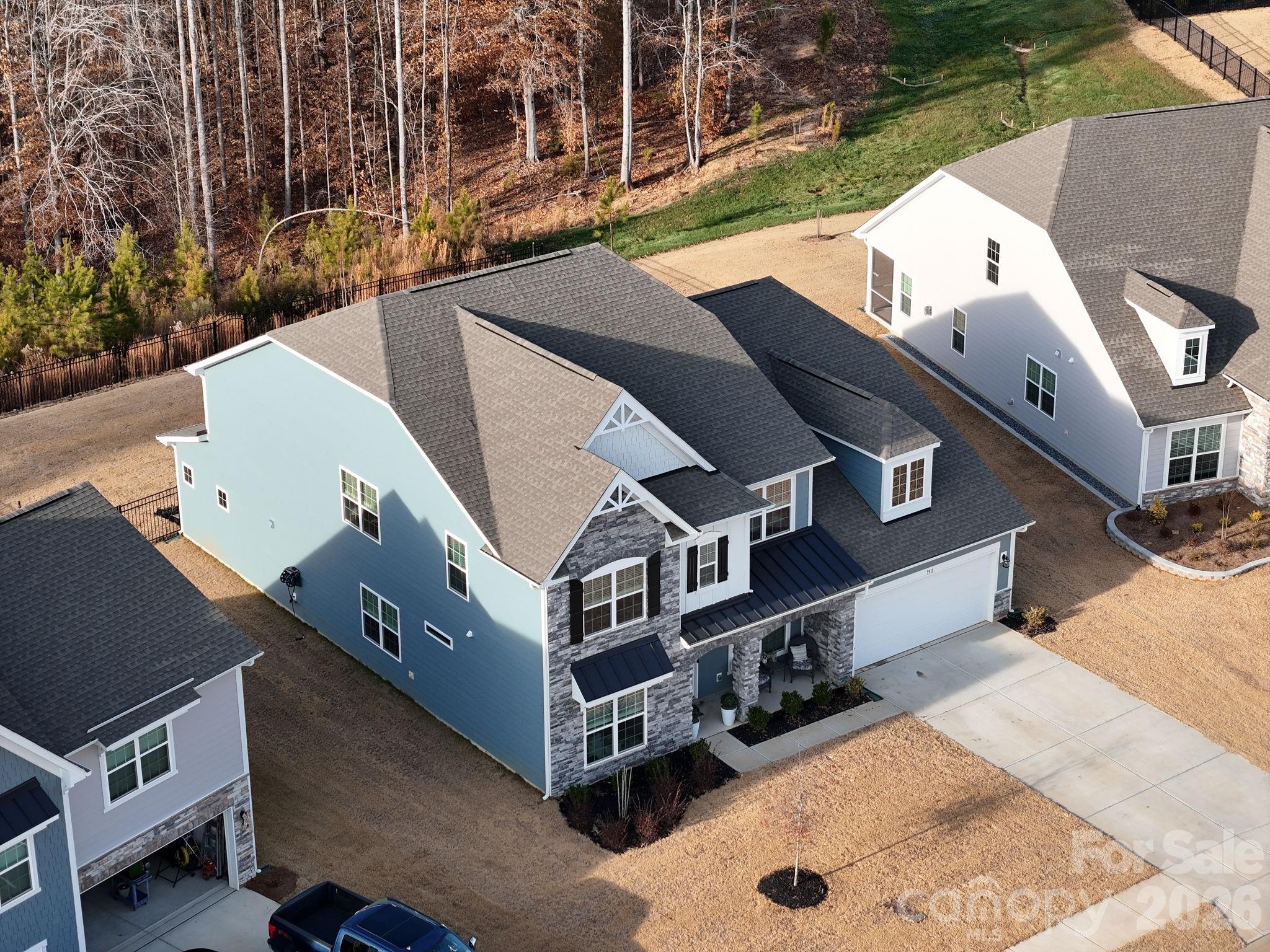 3911 Horsham Street Fort Mill, SC 29707 - Photo 40 of 41 an aerial view of a house with a yard