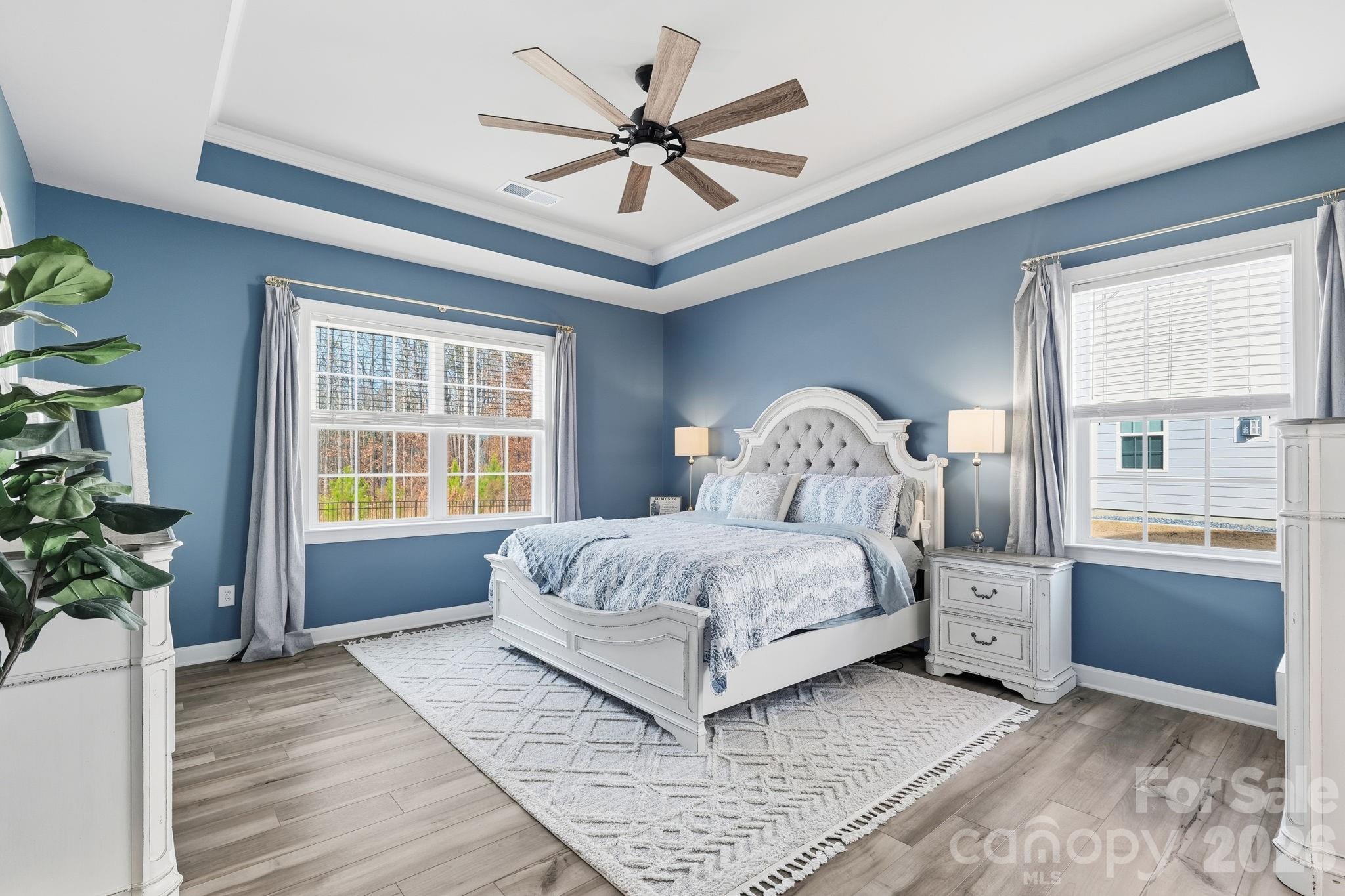 3911 Horsham Street Fort Mill, SC 29707 - Photo 4 of 41 a bedroom with a large bed and a window