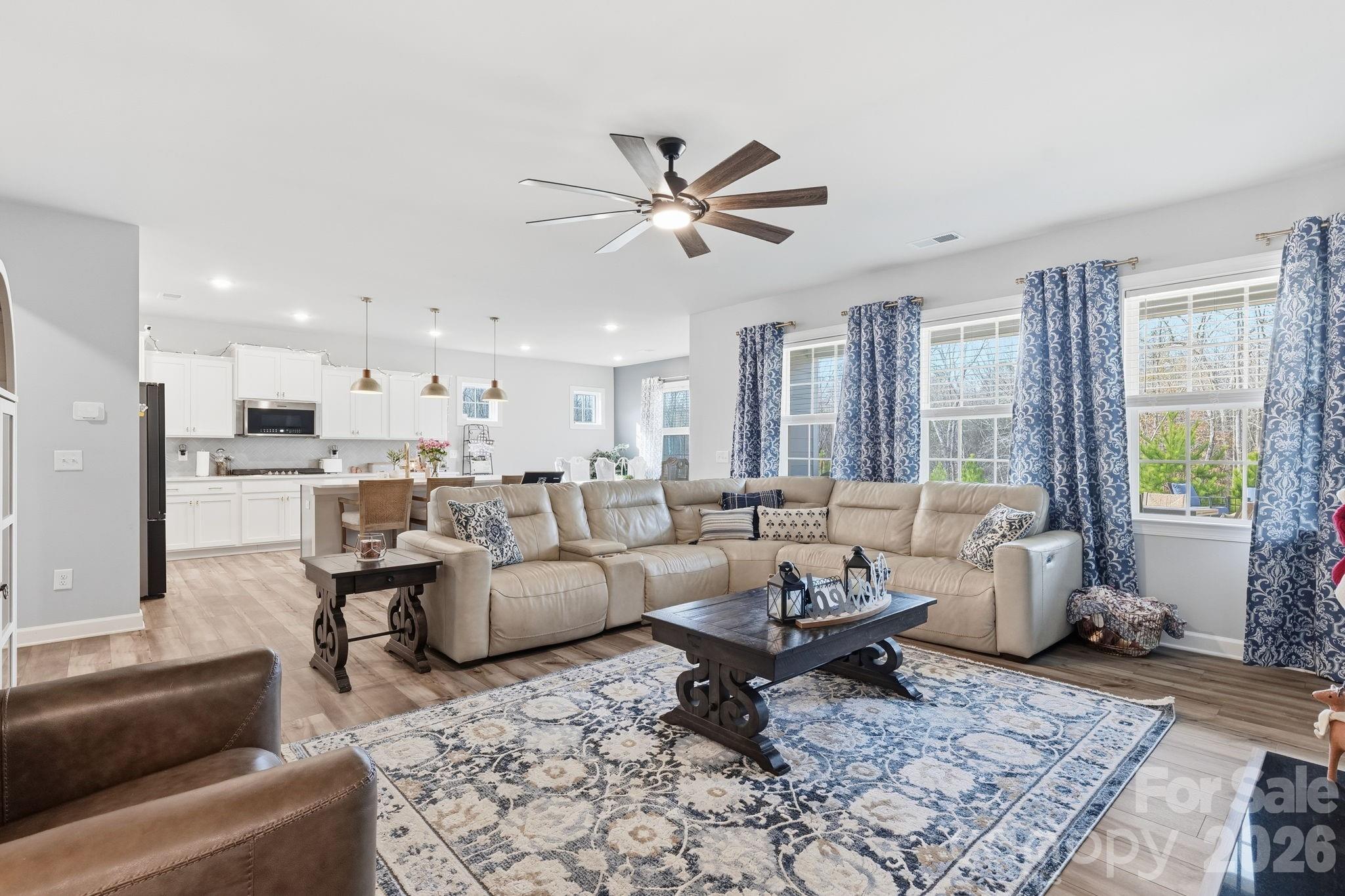 3911 Horsham Street Fort Mill, SC 29707 - Photo 7 of 41 a living room with furniture and a large window