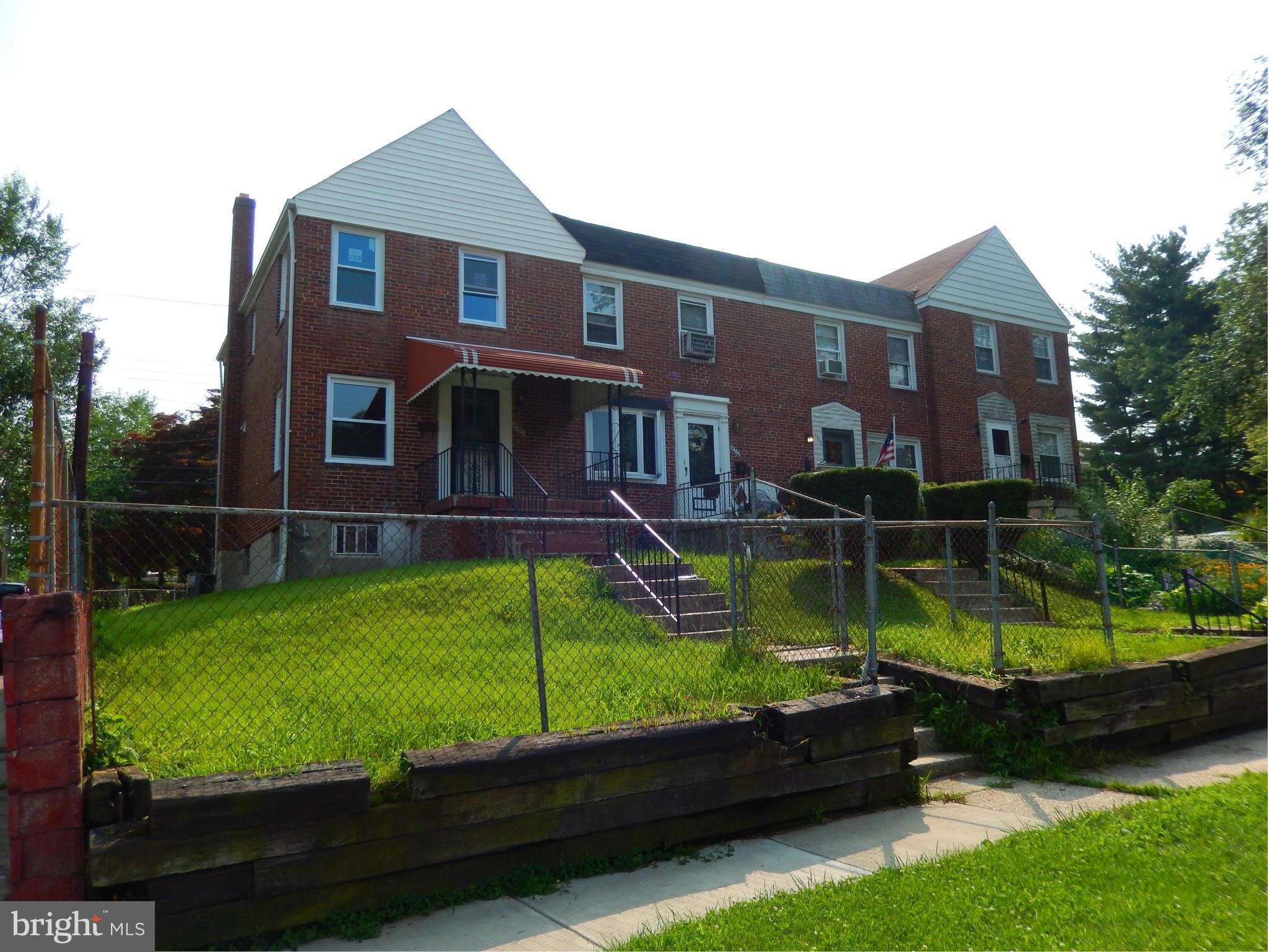 4301 Cedar Garden Road Baltimore, MD 21229 - Photo 1 of 29 a view of a house with backyard