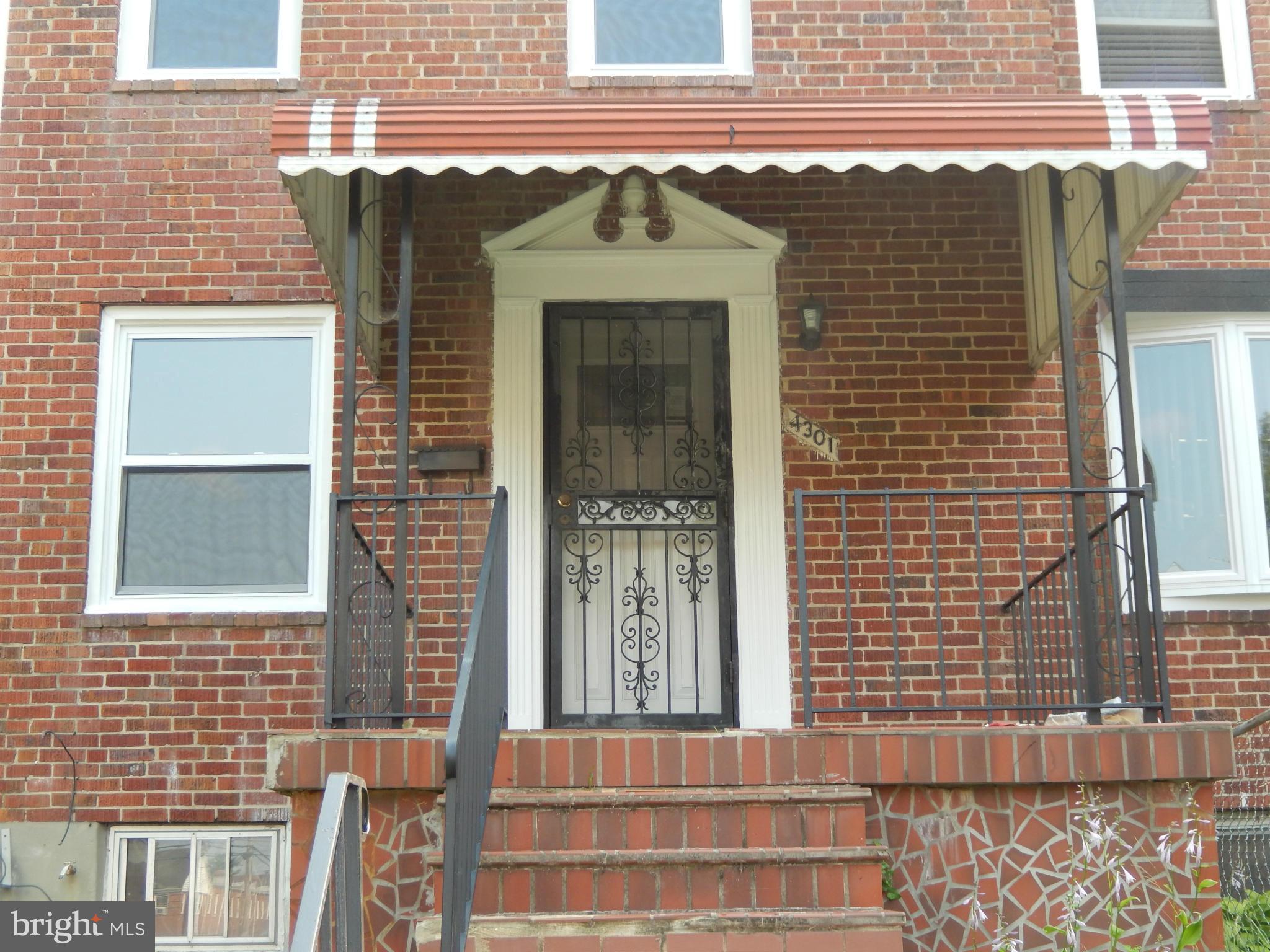 4301 Cedar Garden Road Baltimore, MD 21229 - Photo 2 of 29 a front view of a building