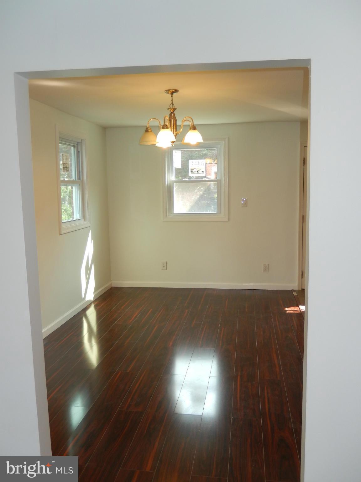 4301 Cedar Garden Road Baltimore, MD 21229 - Photo 15 of 29 a view of lot of kitchen and wooden floor