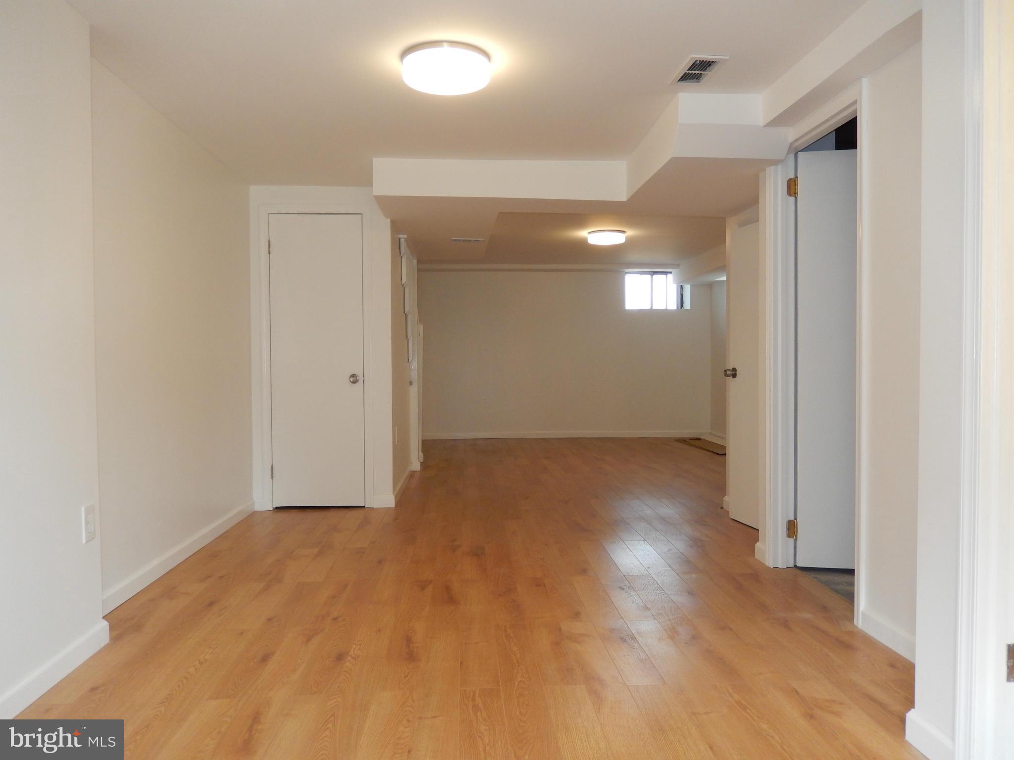 4301 Cedar Garden Road Baltimore, MD 21229 - Photo 27 of 29 a view of an empty room