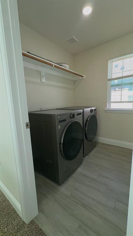 2239 Anderson Street Dallas, TX 75215 - Photo 11 of 16 a utility room with dryer and washer