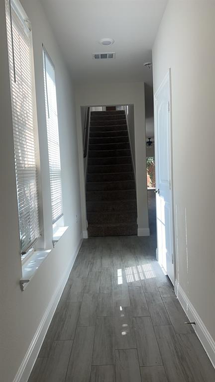 2239 Anderson Street Dallas, TX 75215 - Photo 15 of 16 wooden floor in an empty room with a window