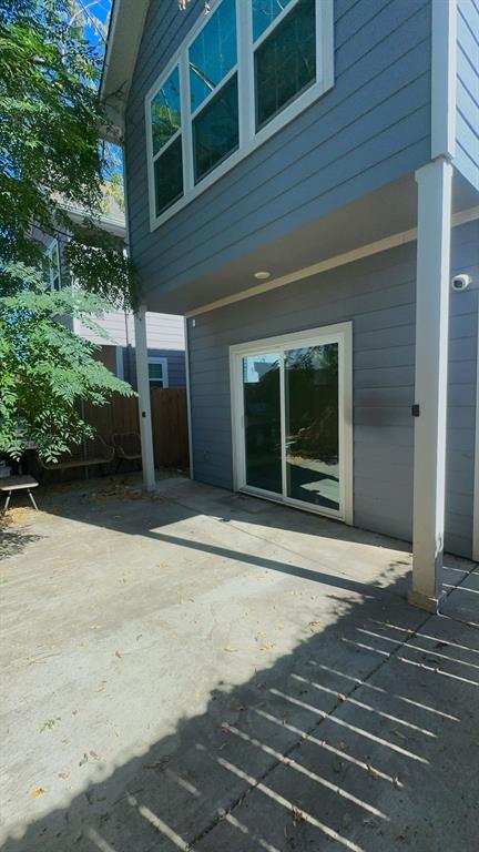 2239 Anderson Street Dallas, TX 75215 - Photo 16 of 16 a front view of a house with a garden