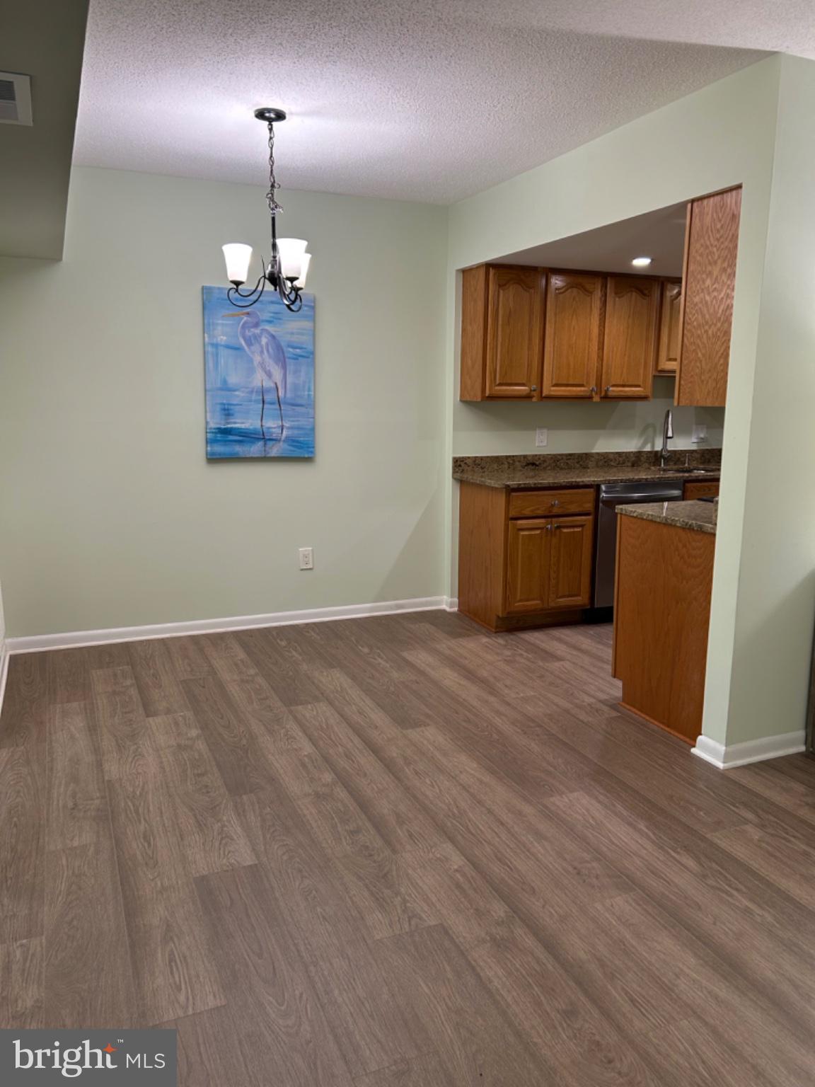 11609 Stoneview Square, Unit 11C Reston, VA 20191 - Photo 21 of 30 Modern kitchen with serene decor.