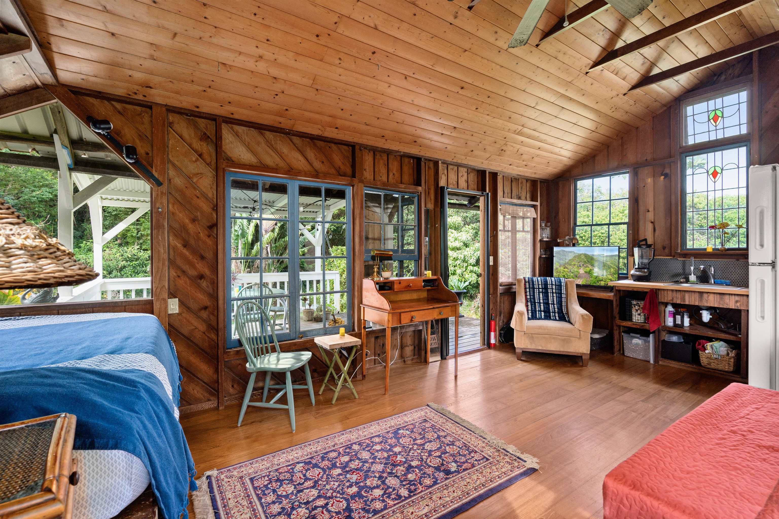 1870 West Kuiaha Road Haiku, HI 96708 - Photo 16 of 27 a outdoor space with lots of furniture and glass door