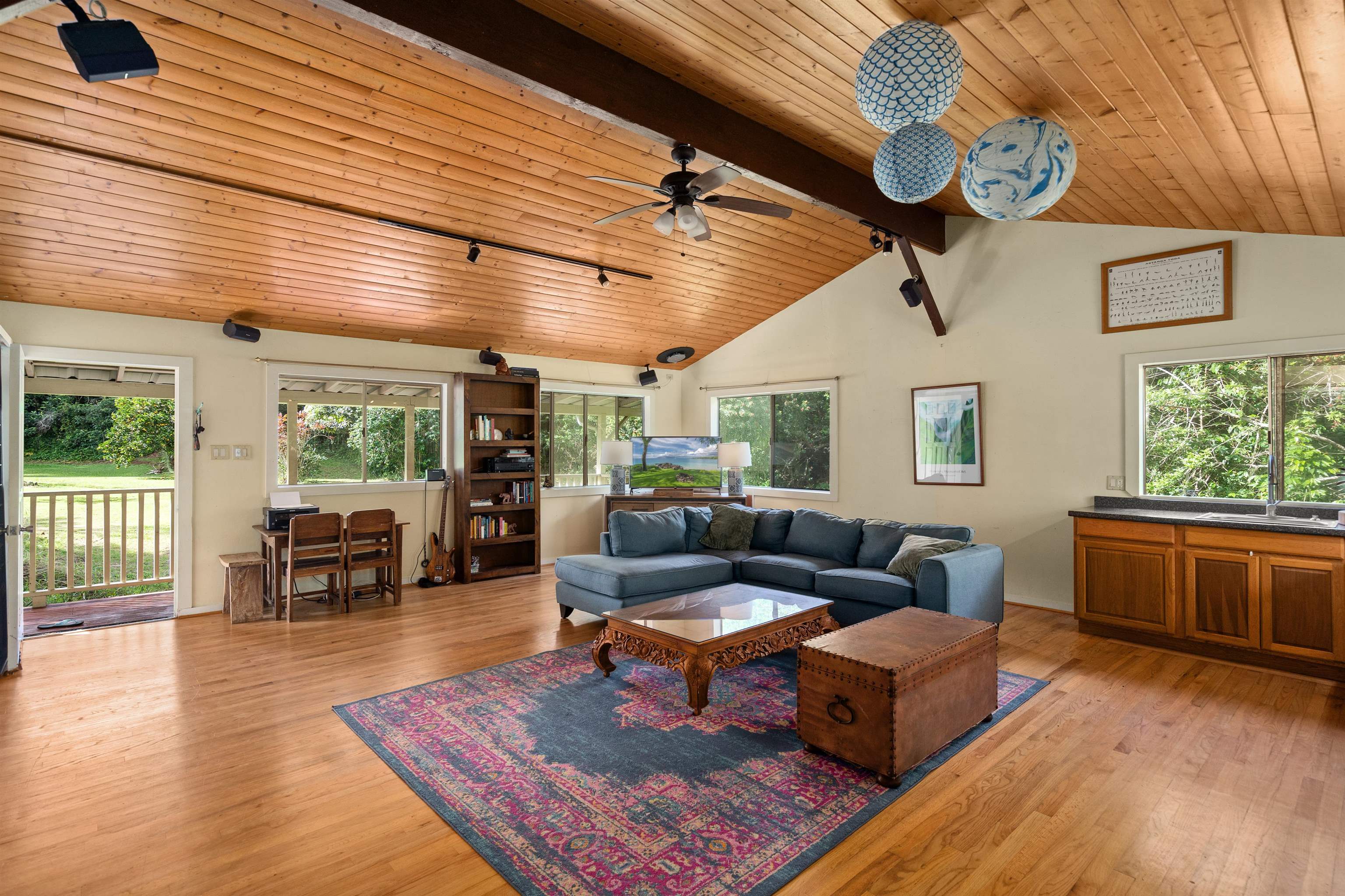 1870 West Kuiaha Road Haiku, HI 96708 - Photo 8 of 27 a living room with furniture a wooden floor and window