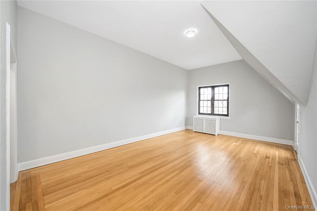 64 Kensington Road, Unit 3B Bronxville, NY 10708 - Photo 5 of 18 Living Room w/Vaulted Ceilings & Hardwood Flooring