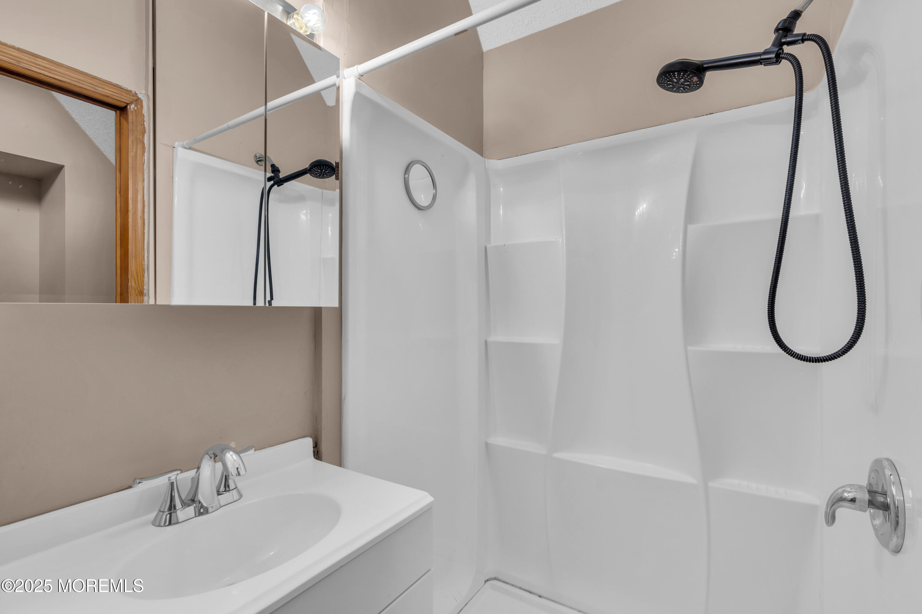 1623 Church Road Toms River, NJ 08755 - Photo 17 of 37 a bathroom with a sink and a mirror