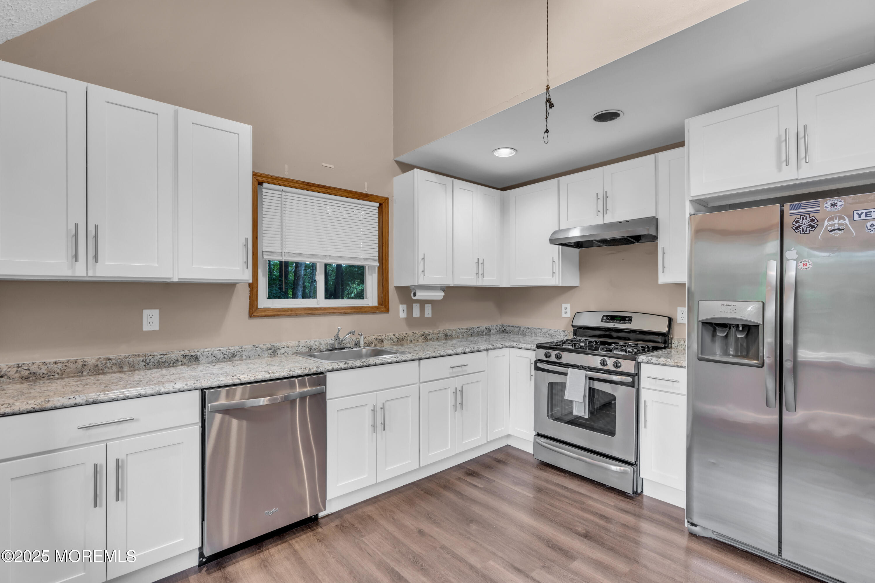 1623 Church Road Toms River, NJ 08755 - Photo 5 of 37 a kitchen with stainless steel appliances granite countertop a sink a stove a refrigerator and cabinets