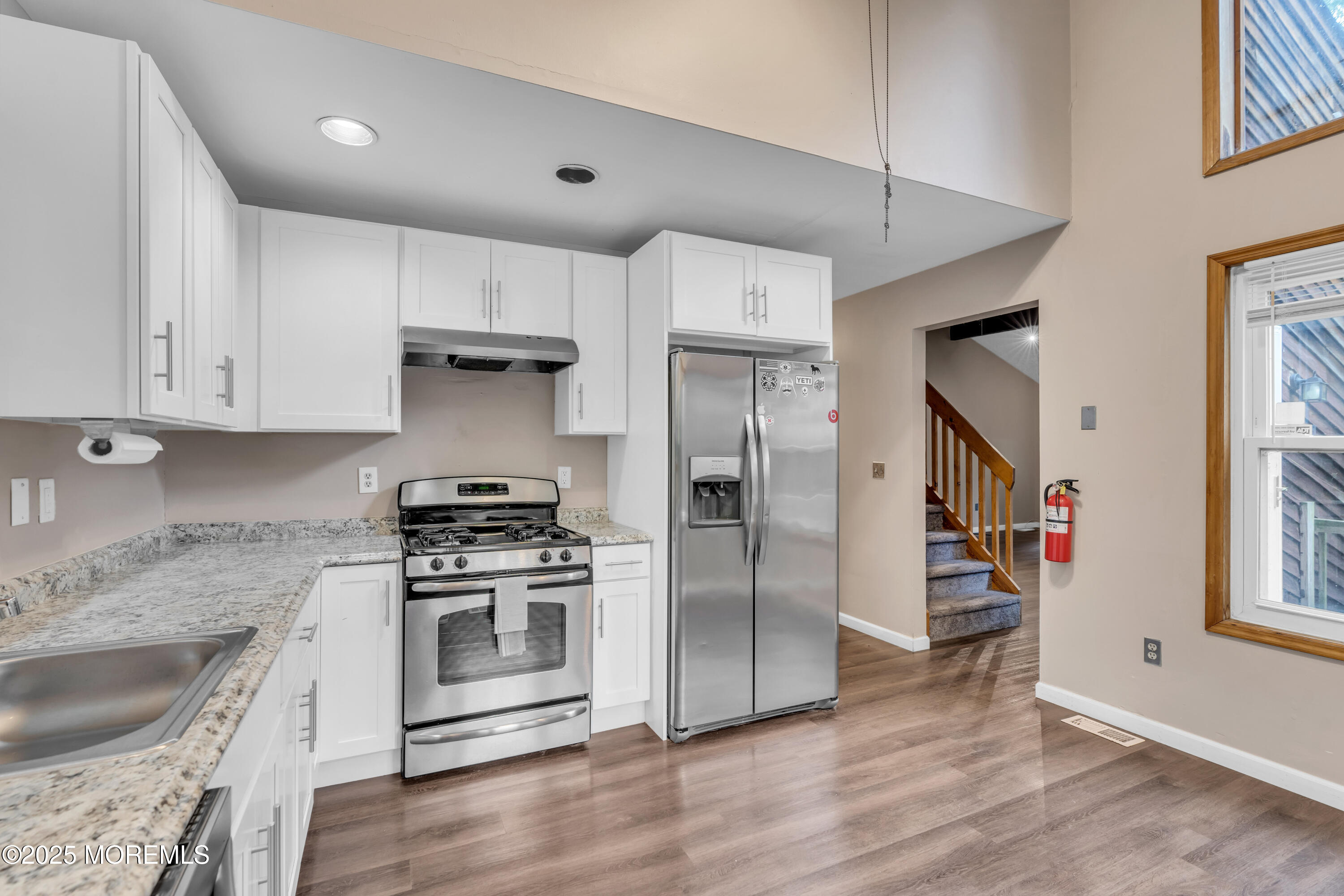1623 Church Road Toms River, NJ 08755 - Photo 10 of 37 a kitchen with stainless steel appliances granite countertop a stove a refrigerator and a sink