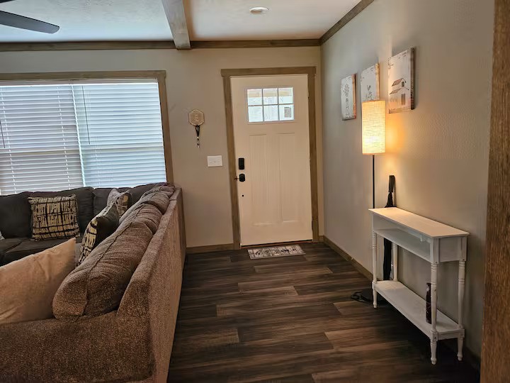 105 Saddle Surrey Road Coldspring, TX 77331 - Photo 17 of 48 a living room with furniture and a window
