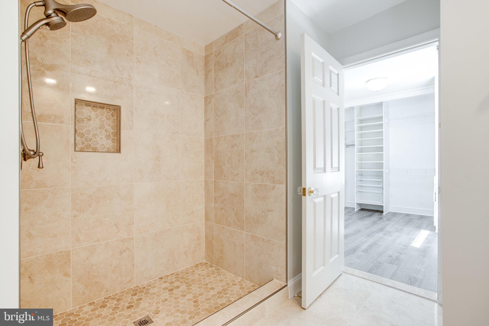 8500 Brook Road McLean, VA 22102 - Photo 31 of 52 a bathroom with a shower