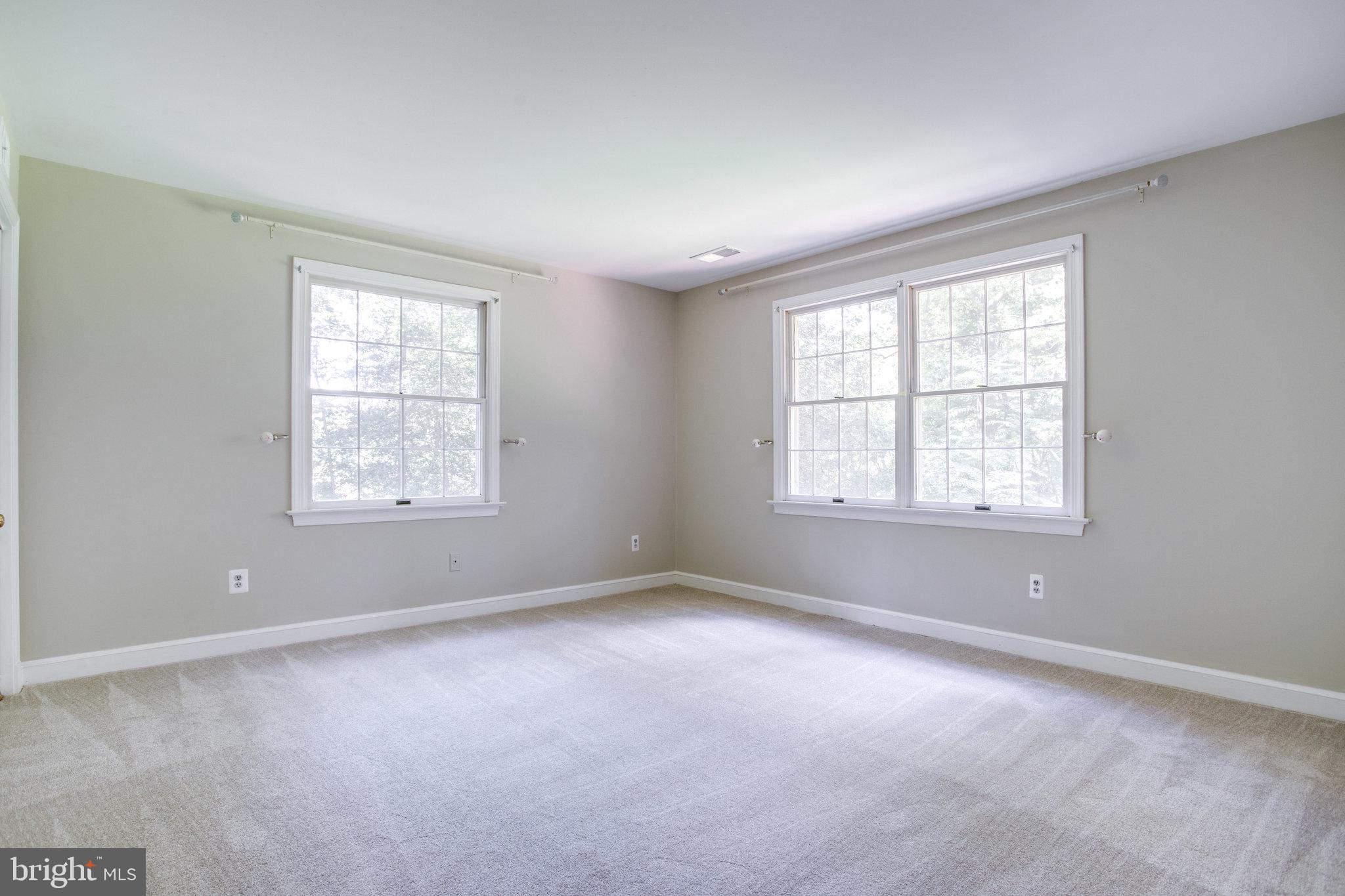 8500 Brook Road McLean, VA 22102 - Photo 32 of 52 an empty room with windows